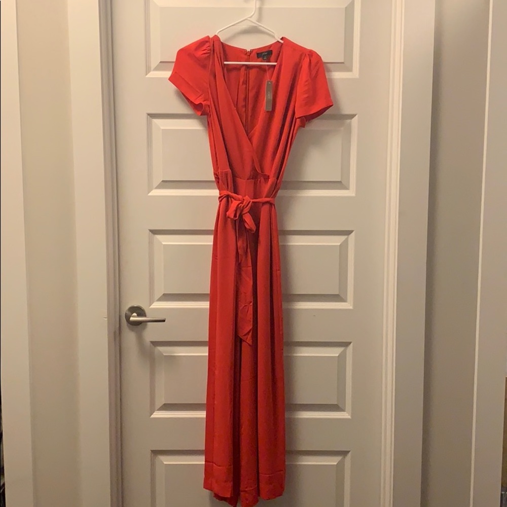 Never worn JCrew orange romper.
